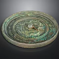 Antique Bronze Mirror Carved Sculpture with Intricate Decorative Patterns and Circular Design