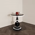 Modern Round Side Table With Black And White Base And Red Cup On Top 3d model