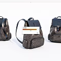 Three Brown Patterned Leather Backpacks With Adjustable Straps And Buckle Closure 3d model