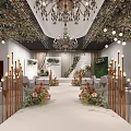 Elegant Banquet Hall With Chandelier Greenery Ceiling Floral Decorations White Aisle And Golden Pillars