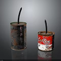 Rusty Silver And Red Can Crafted Candles With Black Wicks On Reflective Surface