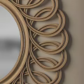 Decorative Round Mirror With Intricate Woven Wooden Frame On Beige Wall