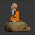 Man With Bald Head And Long White Beard In Orange Robe Sitting Cross-Legged On Rock