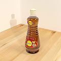 Brown Seasoning Bottle With World Seasoning Label On Wooden Table