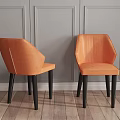 Modern Dining Table Set with Black Tabletop Orange Chairs Vase Flowers and Wall Art in Interior