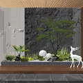 Courtyard Garden Design With Gray Stone Wall Small Green Tree White Deer Statue And Round Lights