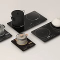 Black Induction Cooktops With Pots And Control Panels For Modern Kitchen Appliances