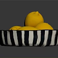 Decorative Black And White Striped Bowl With Fresh Yellow Lemons In Kitchen