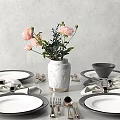 Elegant Dinnerware Set with White Plates Silver Cutlery and Pink Flowers in Vase