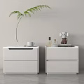 Modern White Bedside Tables With Drawers Glass Vase Green Plant Mug And Decorative Items