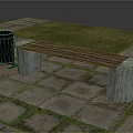 Outdoor Bench With Wooden Slat And Concrete Legs Near Trash Can On Stone Pavement