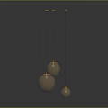 Golden Sphere Pendant Lights Hanging On Dark Background With Reflections