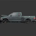 Worn Teal Two Door Pickup Truck With Damaged Front And Rusty Wheels