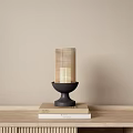 Modern Table Lamp With Grid Pattern Shade And Black Base On Stacked Books 3d model