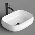 Modern White Vessel Wash Basin With Sleek Black Faucet For Bathroom Countertop