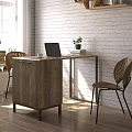 Modern Wooden Desk With Laptop Cup Books Plant And Woven Back Chairs By Brick Wall