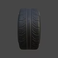 Car Tire With Modern Alloy Wheel Rim Black Spoke Design And Branded Sidewall