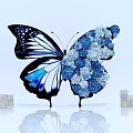 Decorative Butterfly With Blue Flowers And White Skincare Bottles