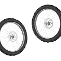 Two Off Road Motorcycle Tires With Deep Tread And Wheel Rims Brake Discs