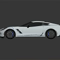 Chevrolet Corvette White Sports Car With Black Stripes Blue Accents Rear Spoiler And Sleek Design