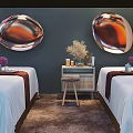 Massage Beds with White Sheets Red Trim Purple Robes and Green Plants in Modern Spa Room