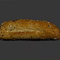 Freshly Baked Golden Brown Grain Topped Bread Loaf With Shiny Surface