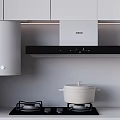 Sleek Modern Kitchen With White Cabinets Black Range Hood Gas Stove And White Pot