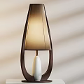 Modern Two Table Lamps With Gold And Dark Frames Light Shades And Minimalist Design