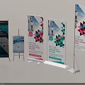 Sturdy Commercial Roll Up Banner Displays With Colorful Triangular Patterns And Business Promotion Information
