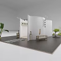 Modern Exhibition Booth with White Curved Walls Green Plants Dark Floor and Display Furniture