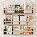 Books and Magazines Arranged on Wooden Shelves With String Lights and Colorful Covers