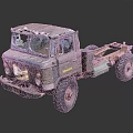Old Worn Truck With Large Tires Exposed Chassis And Rustic Exterior