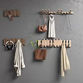 Wooden Wall Hooks On Gray Wall With Coats Bags Headphones And Scarves