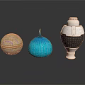Decorative Golden Patterned Ball Blue Striped Onion Shaped Object And Silver Black Jar Arrangement