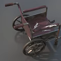 Medical Equipment Wheelchair Featuring Red Upholstered Seat And Metal Frame With Spoked Wheels