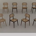 Modern Rattan Back Dining Chairs With Wooden Legs And Various Tones On White Floor