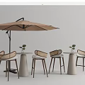 Outdoor Table And Chair Set With Woven Rattan Chairs Round Light Gray Table Brown Parasol And Small Green Plants