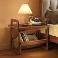 Wooden Bedside Table With Table Lamp Photo Frame Cup And Books Next To Bed