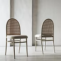 Modern Dining Chairs With Woven Backrest And Light Colored Seat Cushion In Minimalist Interior