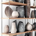 Gray and Brown Ceramic Vessels Arranged on Wooden Shelves with Various Shapes
