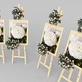 Wooden Art Easels With Framed White Flower Paintings And Decorative Bouquets
