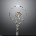 Modern Electronic Device With Circular Frame Central Intricate Pattern And Metal Support Structure
