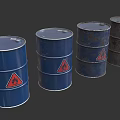 Set of Blue Oil Drums Featuring Red Warning Signs And Rusty Surfaces
