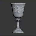 Silver Decorative Goblet With Carved Floral Patterns And Elegant Base Design