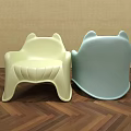 Cute Animal Shaped Children's Chairs with Light Yellow and Blue Colors in Wooden Floor Room