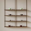 Various Colored Teapots Arranged on Multi Layer Metal Frame Shelf with Light Background