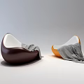 Modern Leisure Chairs in Brown and Orange with Gray Blankets for Comfortable Seating