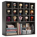 Collectible Dolls Display on Shelf with Books Pencils and Art Supplies