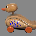 Wooden Toy Duck With Orange Beak Wheels And Blue Fish Scale Design