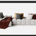 Gray Sectional Sofa With Decorative Pillows And Burgundy Blanket For Living Room